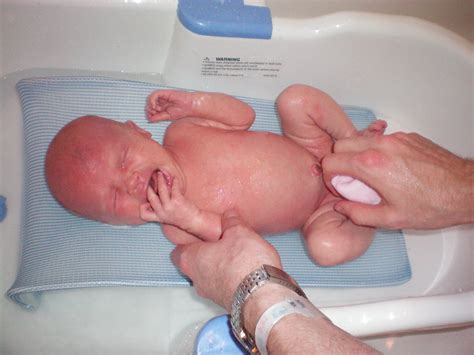 And how to bath a baby and the reasons for a bathing baby after circumcision. The Howie House: First Bath