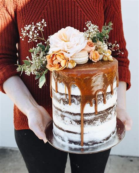 Cut wax paper or roll a thin layer of fondant to cover the part of the cake that touches the flower. 27 Yummy Drip Wedding Cakes For The Fall - Weddingomania