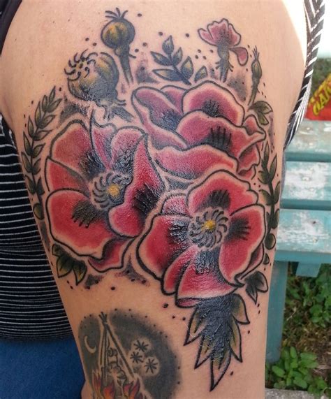 Tribal tattooing dates back a long time ago. Traditional poppies done by Pugsley @ Dark Side Tattoo in ...