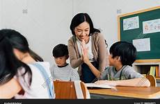 asian teacher young stock