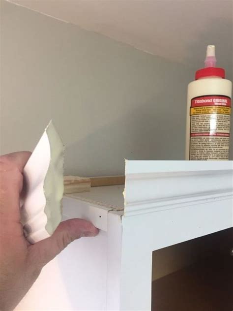 Unless there is ample room above the doors to attach a crown molding, or if you are using a very wide crown molding, you will need to install a nailer strip to support the installation. Kitchen Cabinet Crown Molding - Make Them Fancy! | Kitchen cabinet crown molding, Kitchen ...