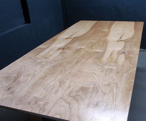 Keep repeating this, overlapping areas, until you have gone over the entire tabletop. DIY Modern Birch Table from One Sheet of Plywood