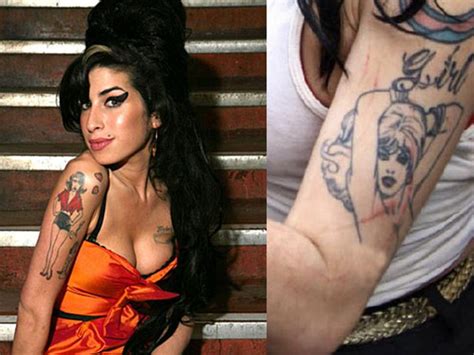 Amy wine house trug früher perücken mit hohem bienenstock und verwendete sportflügel. Popular Amy Winehouse Tattoos With Unique Designs