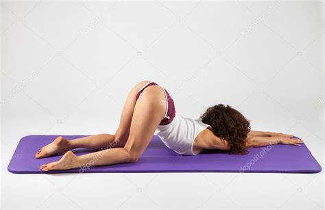 @assatanataa's account is temporarily unavailable because it violates the twitter media policy. Sexy woman doing yoga exercises — Stock Photo © RVAS #90484002