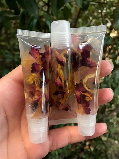 Clear lip gloss with flowers inside. Plumping Rose & Sunflower Petals Clear Lip Gloss Flower ...