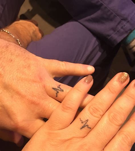 Couples ring tattoos marriage tattoos best couple tattoos couple ring finger tattoos mutterschaft tattoos friend tattoos mini tattoos tattos sister tattoos. Ring finger tattoo of heartbeats for happily married ...