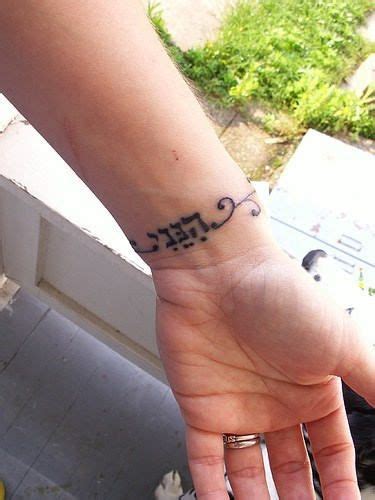 Hebrew phrases tattoo on foot. Hebrew Wrist Tattoos Hebrew band tattoo on wrist | Yahweh ...