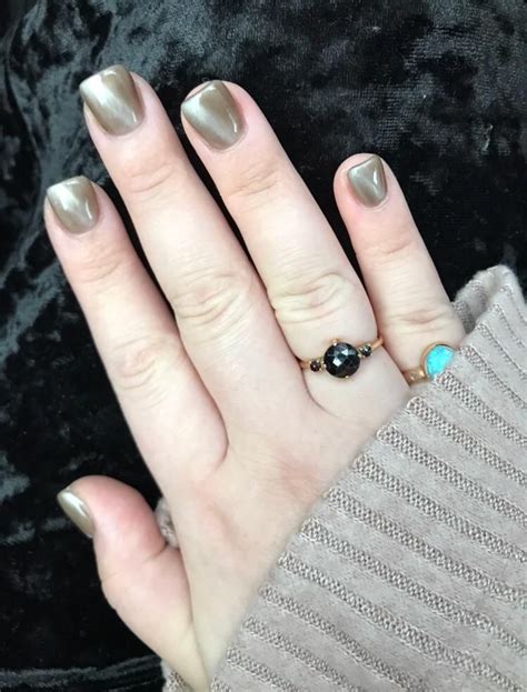 Rainy day inspired this grey cat-eye shellac. The picture ...