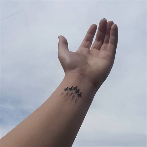 Drawn with dotted lines which usually indicate the various elements of a bracelet, the tattoo is drawn downwards to appear as if hanging from the hand. Airplane Tattoo Ideas That Will Make You Want To Travel ...