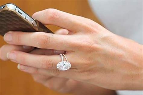 Blake lively's engagement ring has a pavet band in 14k rose gold. The Oval-Cut Diamond Engagement Ring Buyer's Guide | The ...