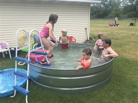 There are 1.2 million backyard swimming pools in australia and costs start from about $45,000. How to Make a Stock Tank Pool | Embracing Motherhood