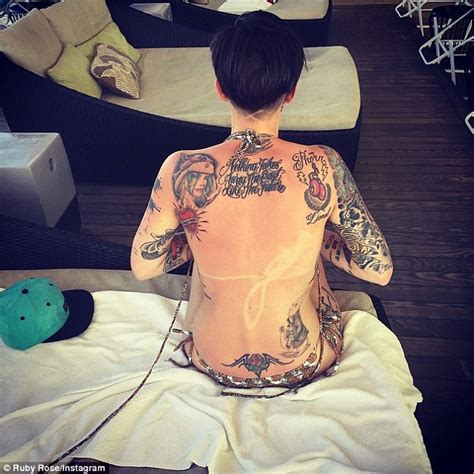 #rose tattoo #flower tattoo #arm tattoo #black and grey tattoo. Ruby Rose shows off sunburn during trip Down Under with ...