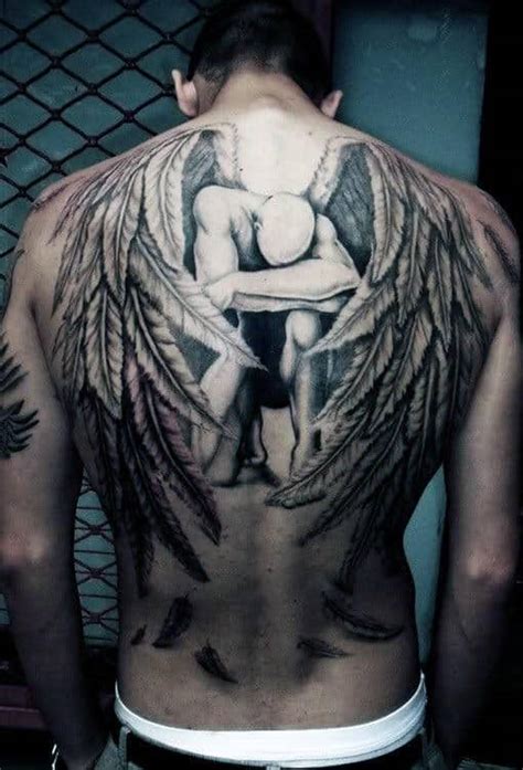 Here is another unique tattoo of a cross that seems to be inspired by the shield of the warrior. Top 50 Best Back Tattoos For Men - Ink Designs And Ideas