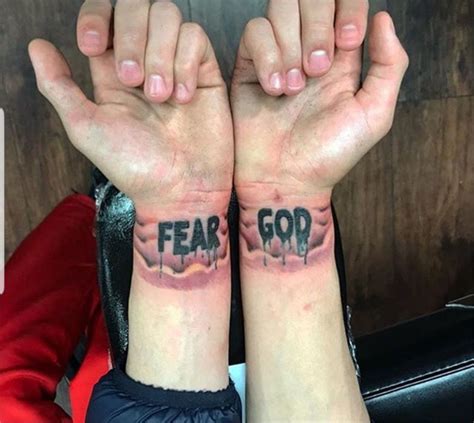 Fear no one but god. Fear God Tattoo Wrist - tattoo design