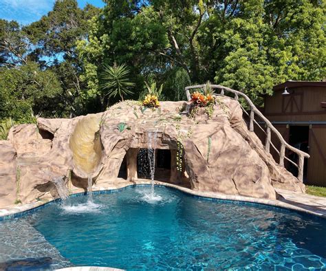 They're typically incorporated into the pool's structure, but can also be installed separately (especially in the case of above ground pools). Backyard Pool Grotto With Slide and Hot Tub. : 8 Steps ...