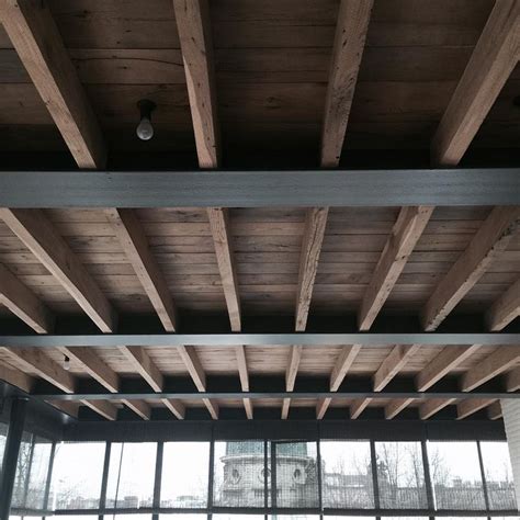 I have been looking at some steel beams to support this ceiling, to run horizontally inside the ceiling. play of #wood#wooden#and #steel#beams#ceiling#graanmarkt13 ...