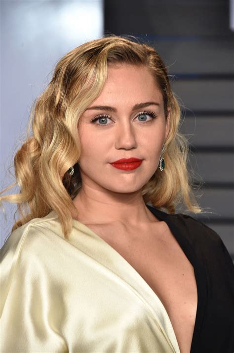 Noted for her distinctive raspy voice, her music spans a range of styles. Miley Cyrus - 2018 Vanity Fair Oscar Party in Beverly Hills