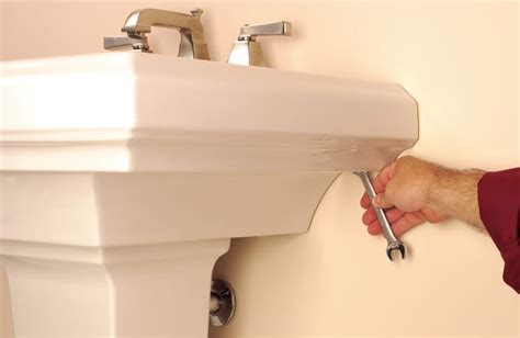 How do you attach a bathroom sink to a countertop. How to Install a Pedestal Sink