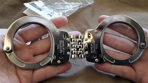 They comprise two parts, linked together by a chain, a hinge, or rigid bar. Handcuff Overview Videos & Descriptions: Yuil M-11-1 Korean (GOOD) Hinged Handcuffs With Anti ...