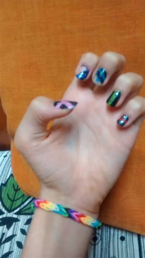 1st, loop an orange rubber band over the tool by twisting it to make a figure eight, then stack on another two orange bands; 8 Ways to Make a Rainbow Loom Bracelet - wikiHow