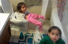 toilet girl baby falls while brother paper mess