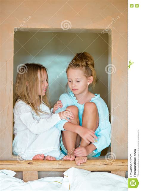 To keep it simple, i am only adding the tags during the main part of the guide and not the alternate paths. Adorable Little Girls Having Fun At Home Stock Photo ...