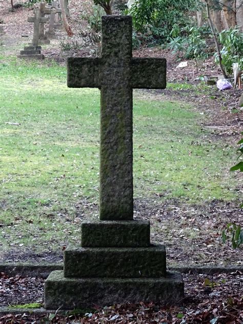 Burial contains thematic echoes of cross' previous work: Burial Cross In A Graveyard Free Stock Photo - Public ...