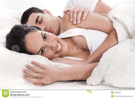 A husband noticed his codoms missing and decided to set up a sting. Loving Husband And Wife Lying In Bed Stock Photo - Image ...