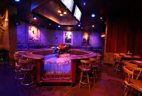 The hottest bartenders, sexiest waitresses. Buck Wild's - Roadhouse-themed sports bar/strip club at ...