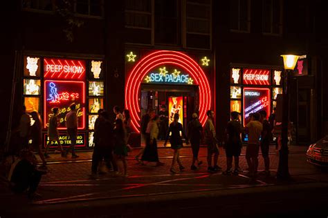 There is a gate marking its entrance and telling kids to stay out. Amsterdam Red Light District Netherlands Sex Stock Photos ...