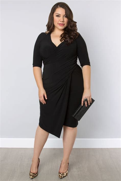 $20 off your order when you join our community. Holy hotness! Our plus size Foxfire Faux Wrap Dress has a ...