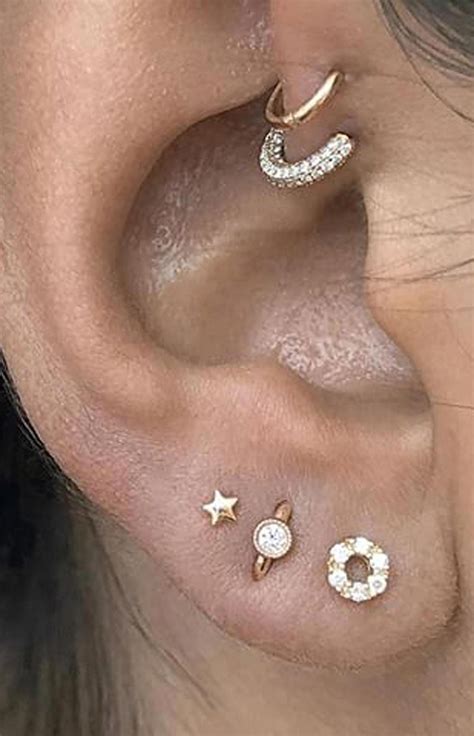 Someone asked me when i would be self piercing again and here is my cringey video lol! cute gold ear piercing ideas double helix jewelry hoops #Cute #double #Ear #Gold... - cute gold ...