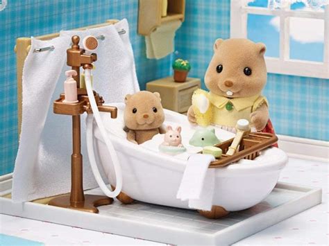 Includes a bath, sink, shower, toilet, and many accessories. Playsets Calico Critters Deluxe Bathroom Set