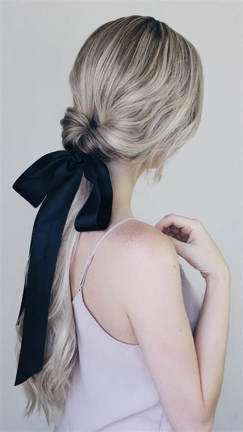 Instead of a traditional fabric hair bow, hair bow hairstyles utilize a person's own long hair to create ta bow shape. Simple Hairstyles Incorporating Bows & Ribbon - Alex Gaboury