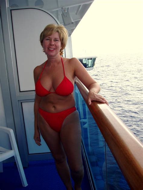 Wish she could give my wife some lessons! Older Women Bikini Cleavage