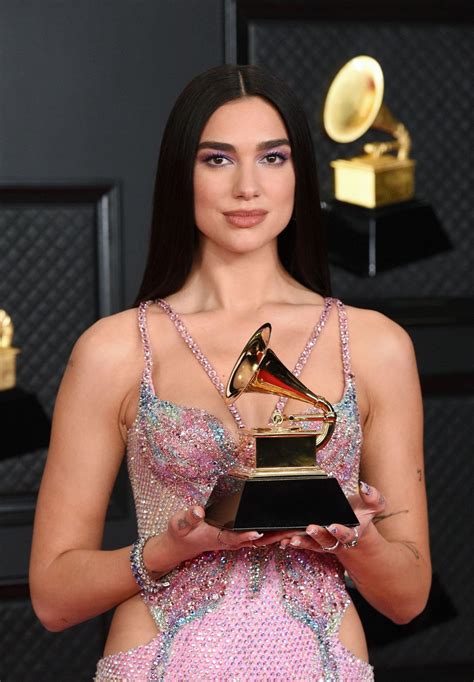 Find more clips and performances from the show here. Dua Lipa - Grammy Awards 2021 • CelebMafia