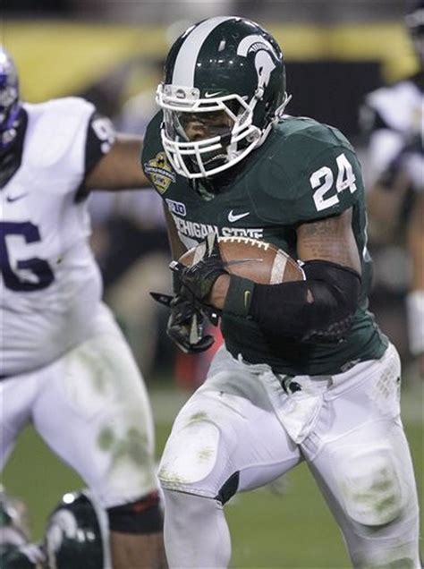 Le'veon bell #24 of the michigan state spartans runs for a short gain as jibreel black #55 of the michigan wolverines makes the stop during the game at michigan stadium on october 20, 2012 in ann arbor, michigan. Michigan State tailback Le'Veon Bell talks about his ...