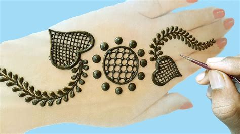 Usually the red color tikki mehndi. Simple Mehndi Designs for Hands || Gol Tikki Mehendi ...