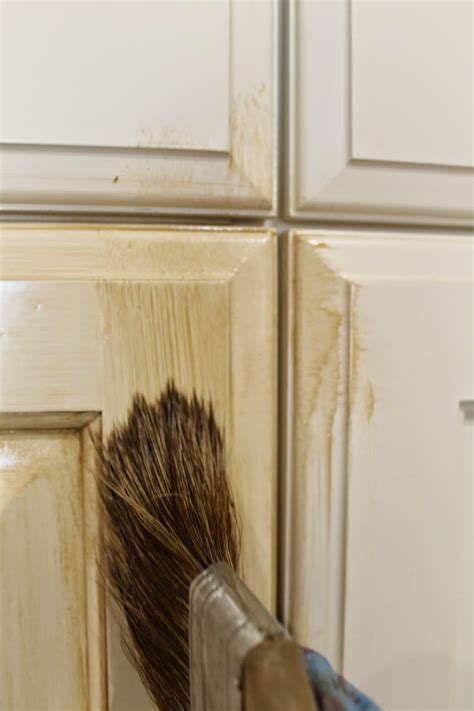 Use a brush to cut in the corners and edges, then a small roller warning: The ragged wren : How-To: Glazing Cabinets