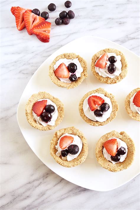 Line a large plate with parchment paper. Vegan No Bake Berry Cookie Cups - Beaming Banana