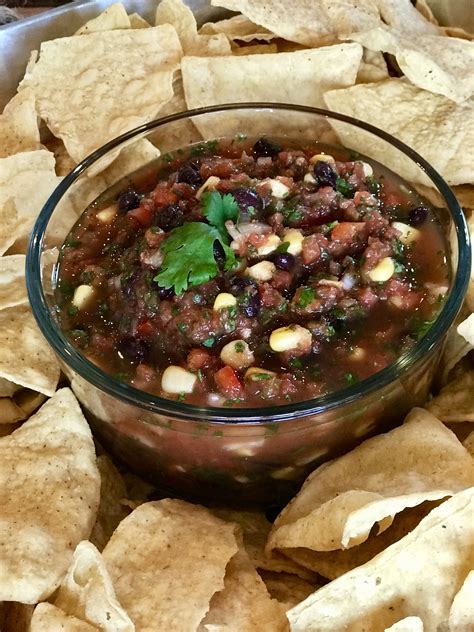 Arrange the chicken on a platter and top with the salsa. Cilantro Lime Salsa - Magnolias and Meltdowns