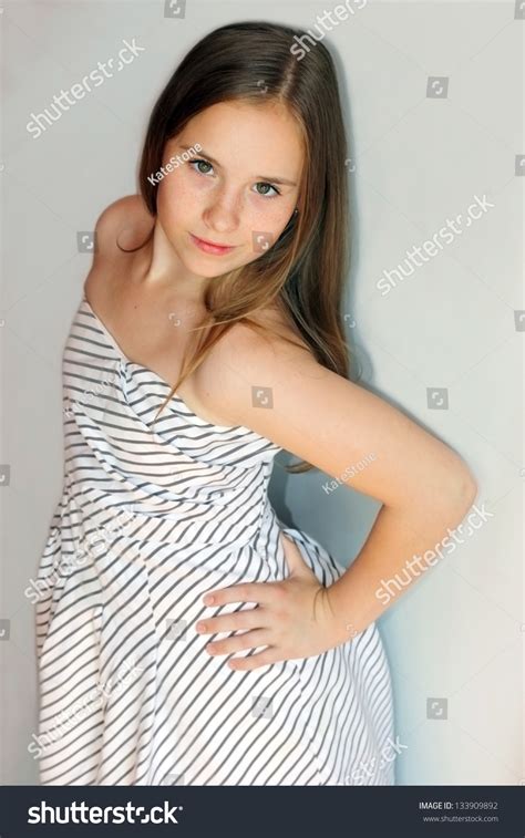 Female with glasses in casual clothes, smiling, background city park,tree, grass, meadow. Beautiful Blondhaired 13years Old Girl Portrait Stock ...