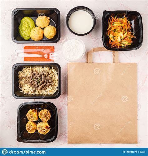 Fast food delivery by postmates. Food Delivery In Lunch Boxes Stock Image - Image of ...