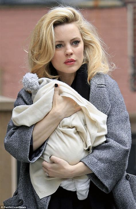 Help us build our profile of melissa george! Melissa George holds on tight to her newborn son Raphael ...