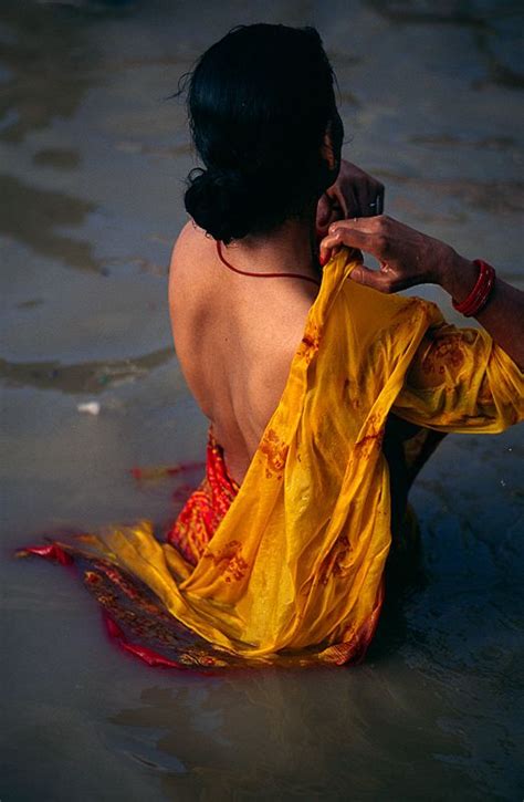 Hot wife loves baby batter. baby-sanyasi: A female pilgrim bathing in the Ganges river ...