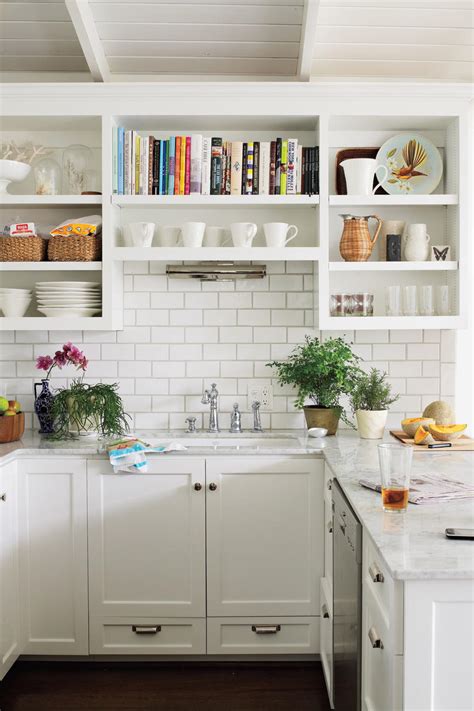 Please consider the era of your home when you are designing your kitchen!! Crisp & Classic White Kitchen Cabinets - Southern Living