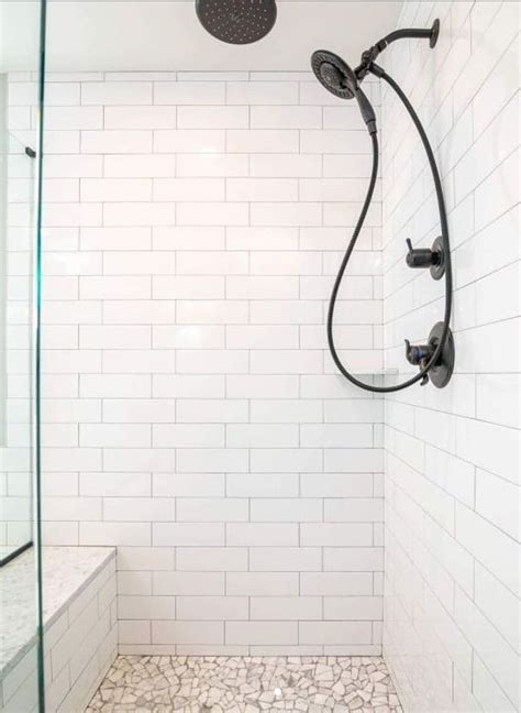 Anna 21 pendant fixture in oil rubbed bronze. Modern Farmhouse Bathroom. White subway tile, oil rubbed ...