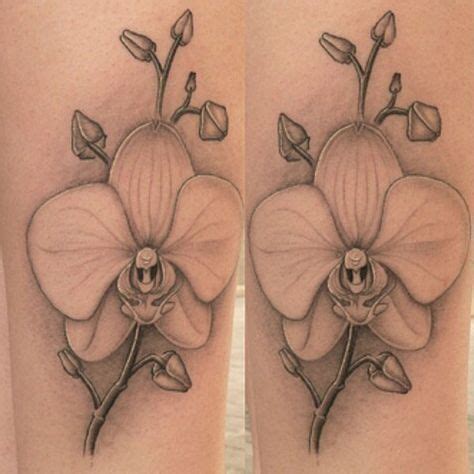 Cute pink orchid tattoo on side rib. 9 Beautiful Orchid Tattoo Designs and Meanings with ...