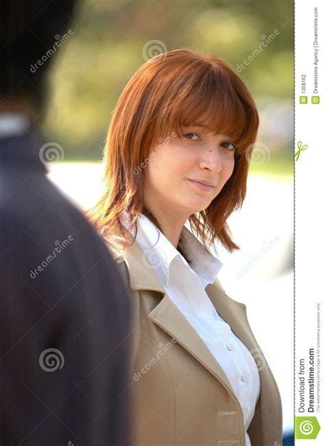 Attractive Coworker stock photo. Image of confidential - 1358162