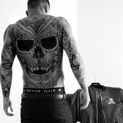 Sugar skulls as the name suggest are the edible decorative skulls that are made. 50 Cool Back Tattoos For Men - Expansive Canvas Design Ideas